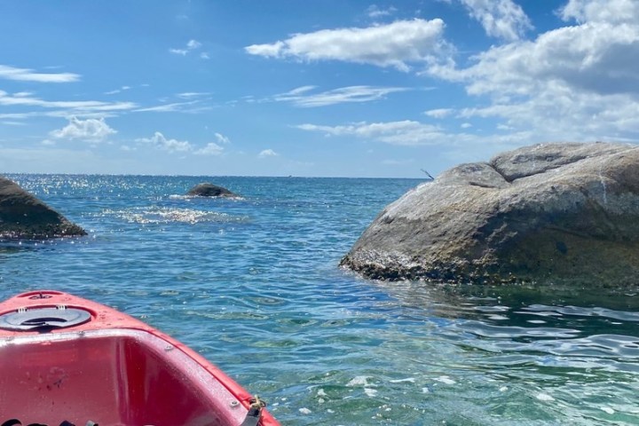 a small boat in a body of water